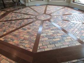 brick and wood tile flooring stone look tile floors in geometric pattern layout